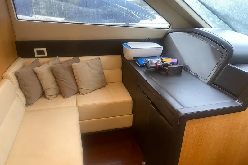  Yacht Photos Pics Luxurious interior of 2011 Sanlorenzo SL62 yacht with cozy seating and modern amenities.