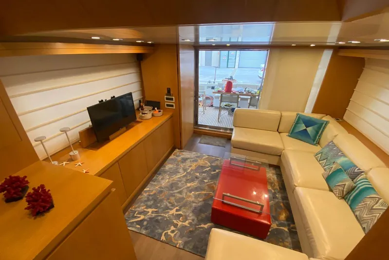  Yacht Photos Pics Luxurious interior of 2011 Sanlorenzo SL62 yacht with modern decor and comfortable seating.