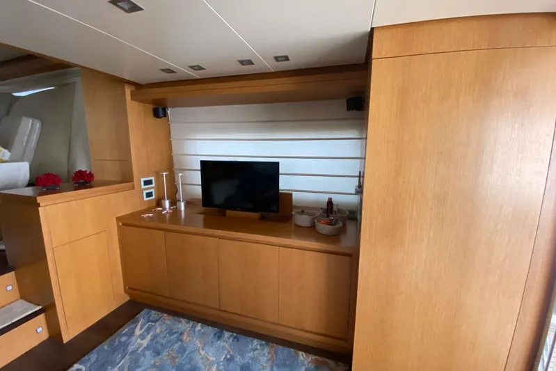  Yacht Photos Pics Luxurious interior of 2011 Sanlorenzo SL62 yacht with wooden cabinetry and modern decor.