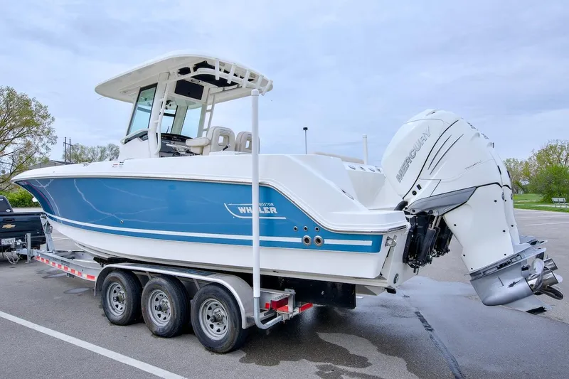 Best Opportunity Yacht Photos Pics 2017 Boston Whaler 280 Outrage boat on a trailer, side view.