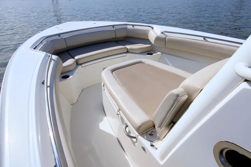 Best Opportunity Yacht Photos Pics 2017 Boston Whaler 280 Outrage boat with spacious seating area on calm water.