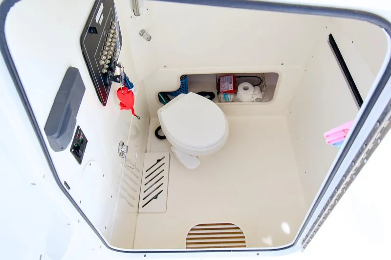Best Opportunity Yacht Photos Pics 2017 Boston Whaler 280 Outrage boat interior bathroom with toilet and storage.