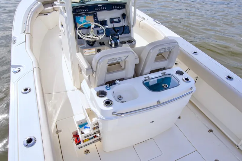 Best Opportunity Yacht Photos Pics 2017 Boston Whaler 280 Outrage boat cockpit with helm and seating.