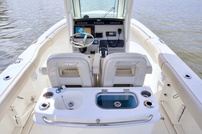 Best Opportunity Yacht Photos Pics 2017 Boston Whaler 280 Outrage boat interior with dual helm seats and control panel.