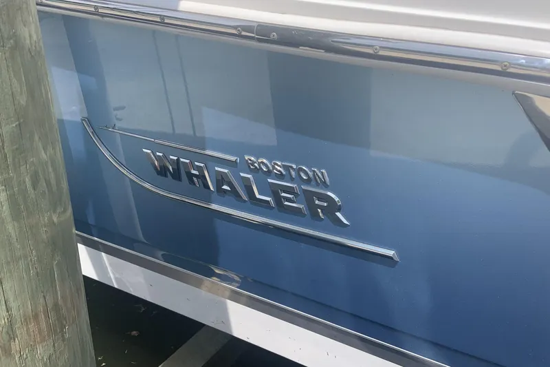  Yacht Photos Pics 2019 Boston Whaler 270 Vantage boat side view with logo.