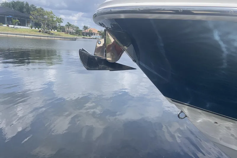  Yacht Photos Pics 2019 Boston Whaler 270 Vantage boat with anchor on calm water.