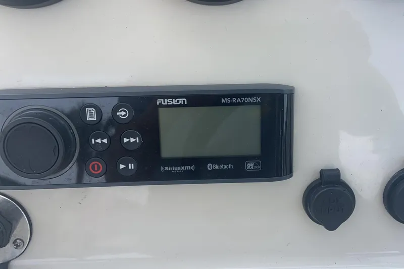  Yacht Photos Pics Fusion MS-RA70NSX stereo system on 2019 Boston Whaler 270 Vantage boat dashboard.