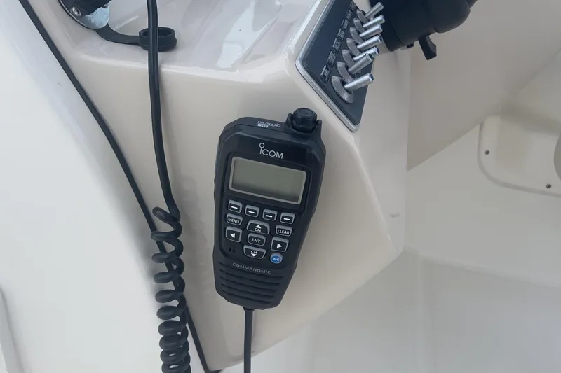  Yacht Photos Pics ICOM radio on 2019 Boston Whaler 270 Vantage boat dashboard.