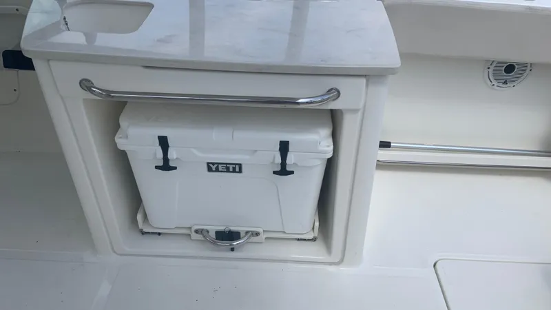  Yacht Photos Pics 2019 Boston Whaler 270 Vantage with Yeti cooler in storage compartment.