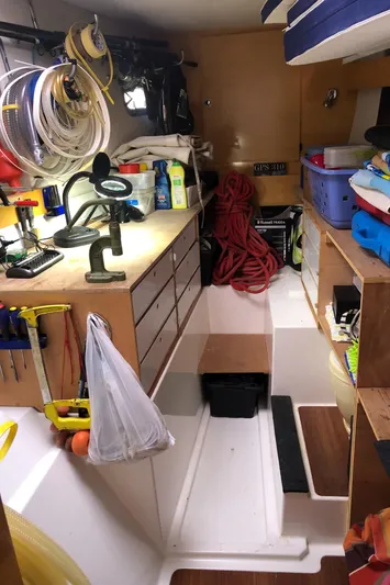  Yacht Photos Pics Interior of a 2008 Fountaine Pajot Salina 48 with tools and equipment.