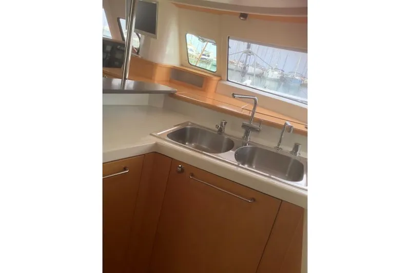 Yacht Photos Pics Interior of 2008 Fountaine Pajot Salina 48 yacht kitchen with dual sinks.