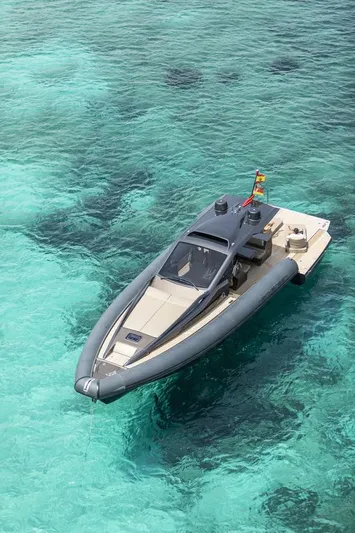 Anvera 48 Yacht Photos Pics Futuristic 2025 Anvera 48 yacht on clear turquoise water, showcasing sleek design and luxury.