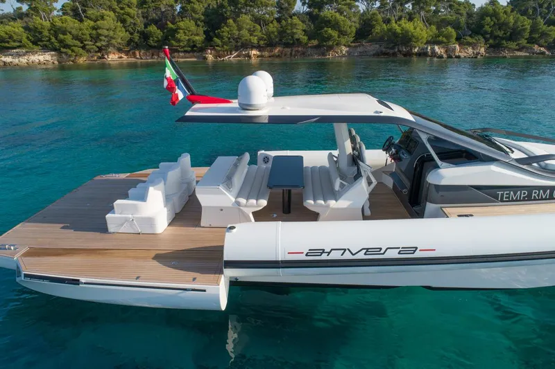 Anvera 48 Yacht Photos Pics Anvera 48 luxury yacht, 2025 model, docked in clear blue water with elegant seating.