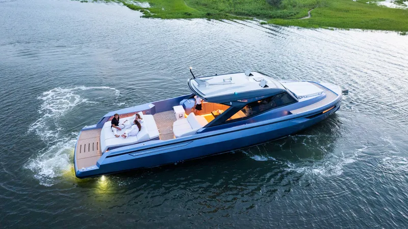  Yacht Photos Pics Luxurious 2026 Santasevera52 yacht cruising on serene waters at sunset.