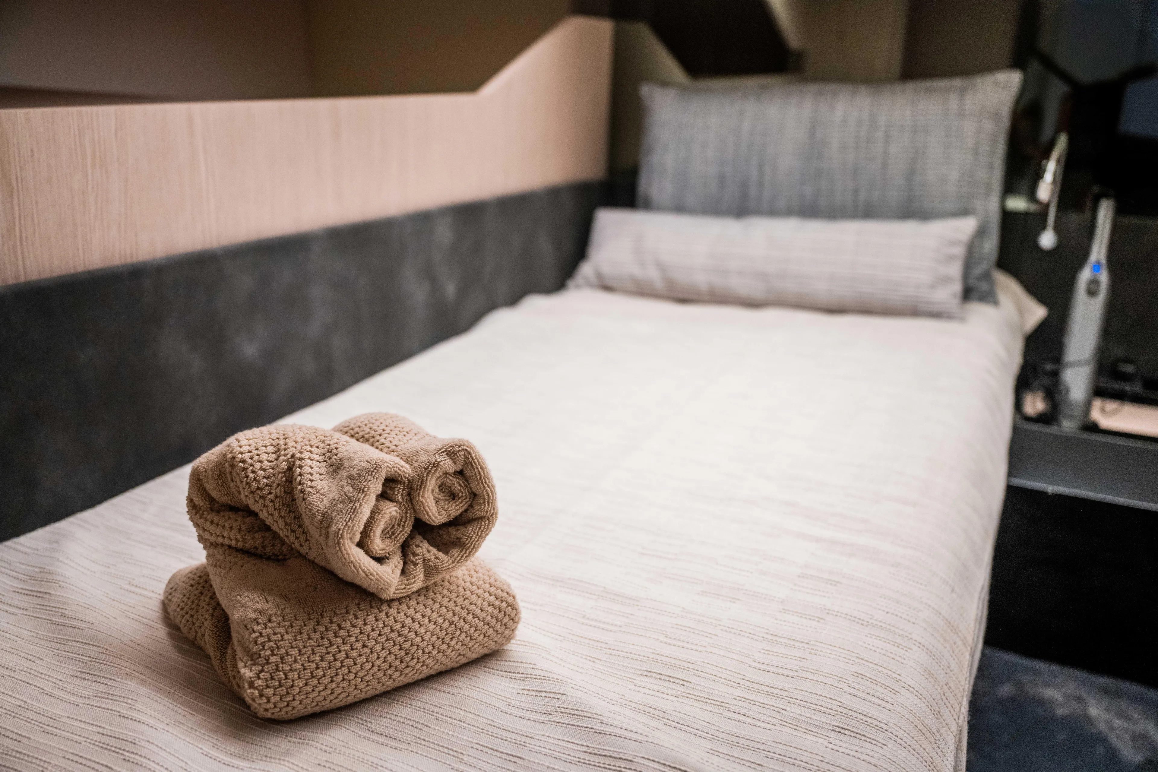  Yacht Photos Pics Luxurious Santasevera52 2026 yacht cabin with neatly folded towels on bed.