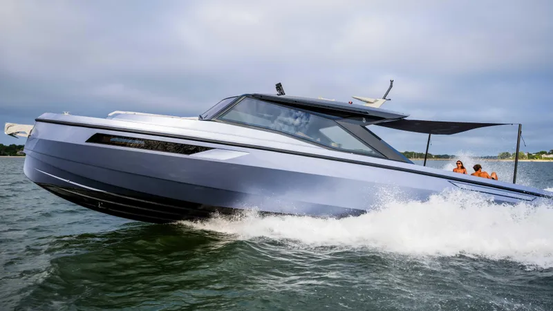  Yacht Photos Pics 2026 Santasevera Santasevera52 yacht cruising on water with passengers enjoying the ride.