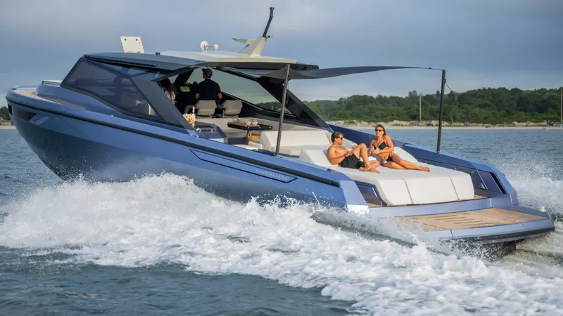  Yacht Photos Pics Luxurious 2026 Santasevera52 yacht cruising with passengers relaxing on deck.