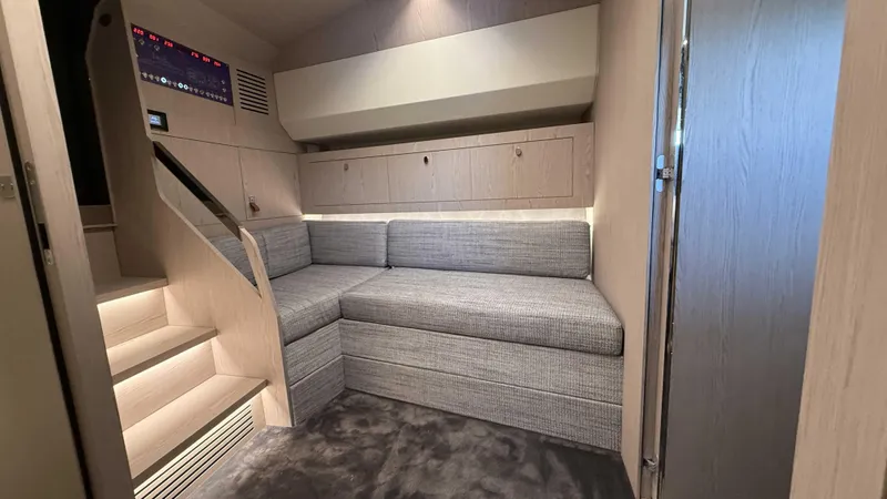  Yacht Photos Pics Modern interior of 2026 Santasevera52 yacht with cozy seating and sleek design.