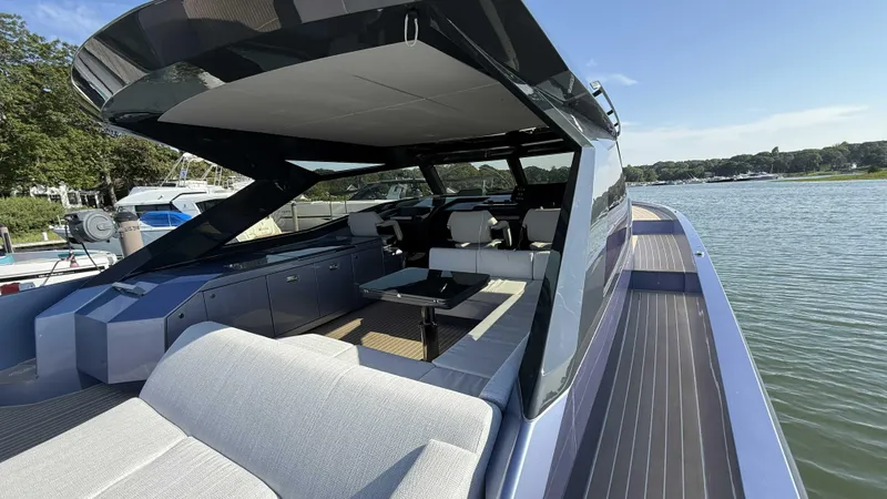  Yacht Photos Pics Luxurious 2026 Santasevera52 yacht with sleek design and spacious deck on a serene waterway.
