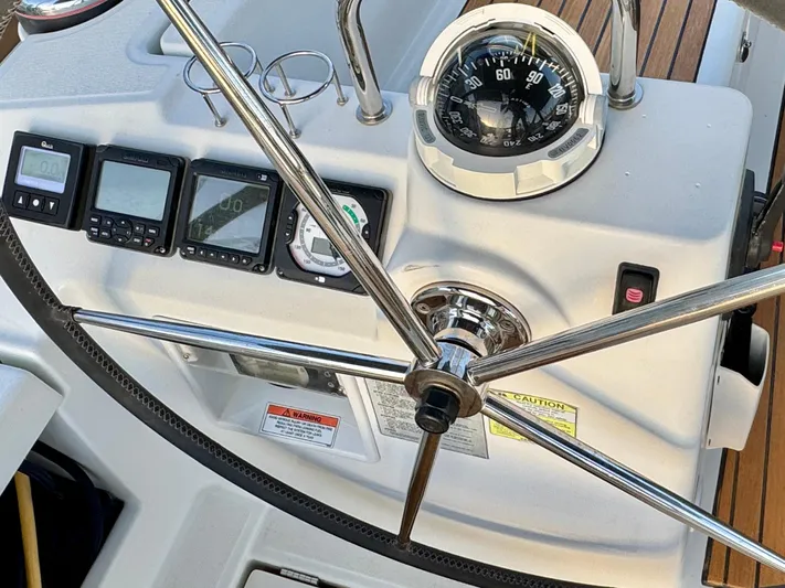 Sol Searcher Yacht Photos Pics Beneteau Oceanis 41 yacht helm with compass and navigation instruments, 2013 model.