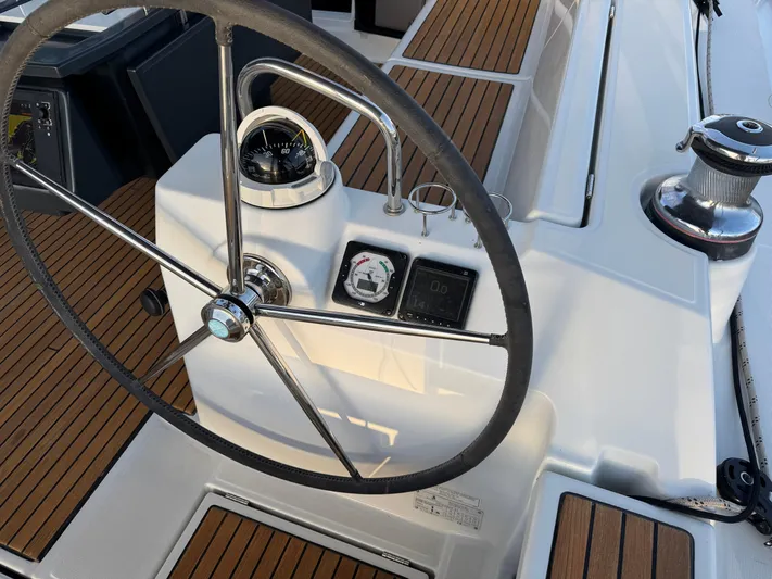 Sol Searcher Yacht Photos Pics Steering wheel and controls of a 2013 Beneteau Oceanis 41 sailboat.