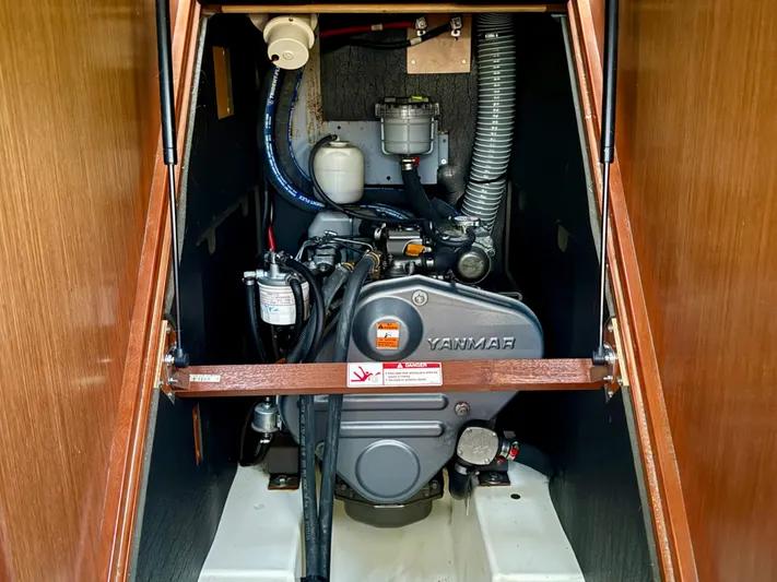 Sol Searcher Yacht Photos Pics Engine compartment of a 2013 Beneteau Oceanis 41 sailboat, featuring a Yanmar engine.
