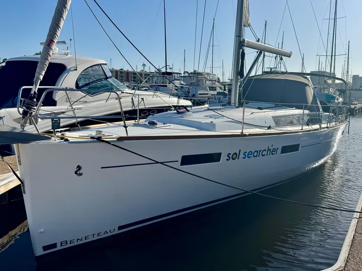 Sol Searcher Yacht Photos Pics 2013 Beneteau Oceanis 41 sailboat docked in marina, named "Sol Searcher."