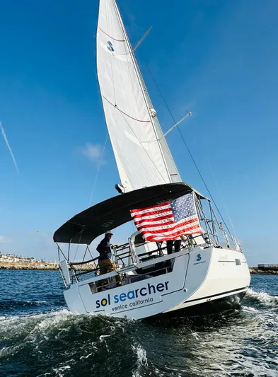 Sol Searcher Yacht Photos Pics Beneteau Oceanis 41 sailboat, 2013 model, sailing with American flag, Venice, California.