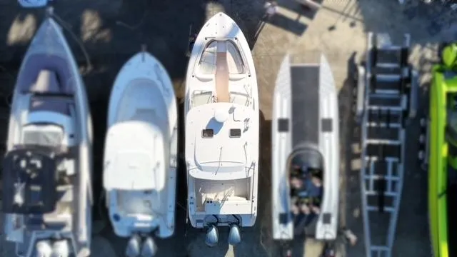  Yacht Photos Pics Aerial view of boats docked, featuring a 2013 Grady-White Freedom 335.
