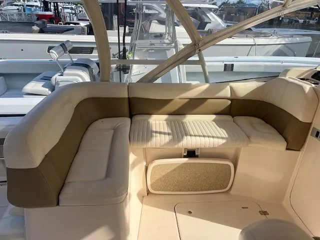  Yacht Photos Pics 2013 Grady-White Freedom 335 boat interior with cushioned seating area.