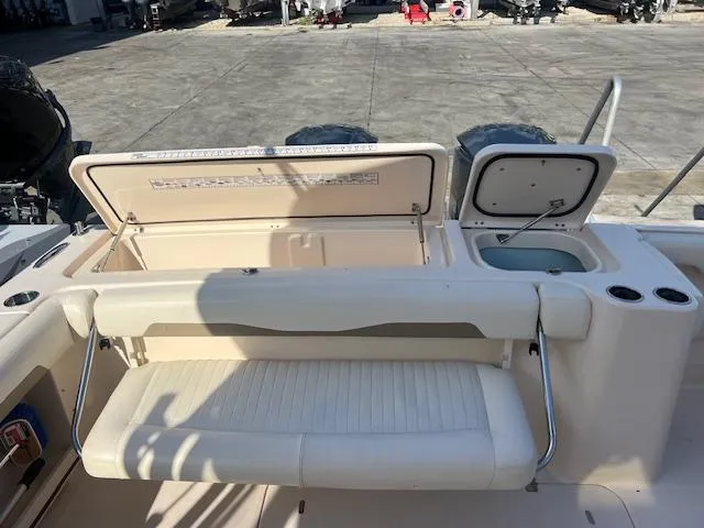  Yacht Photos Pics 2013 Grady-White Freedom 335 boat interior with seating and storage compartments.