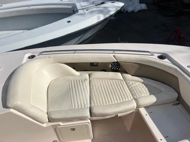  Yacht Photos Pics 2013 Grady-White Freedom 335 boat interior with cushioned seating area.