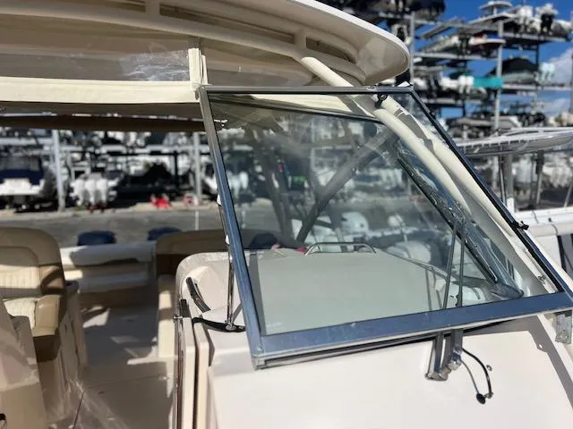 Yacht Photos Pics 2013 Grady-White Freedom 335 boat windshield and interior view at marina.