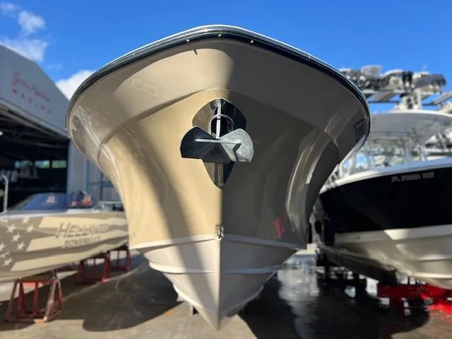  Yacht Photos Pics 2013 Grady-White Freedom 335 boat in a marina, front view.