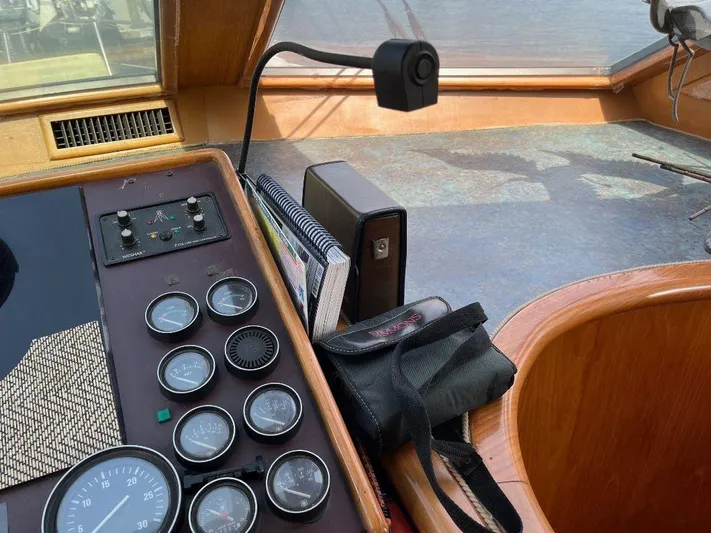 Lady Elaine Yacht Photos Pics Control panel of a 1993 Kha Shing Motoryacht with gauges and navigation equipment.