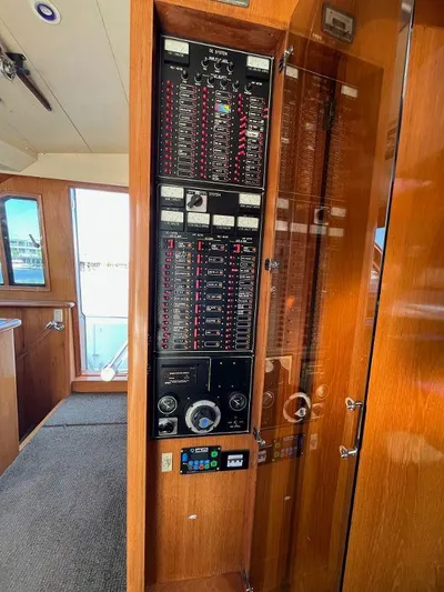 Lady Elaine Yacht Photos Pics Control panel inside a 1993 Kha Shing Motoryacht, featuring various switches and gauges.