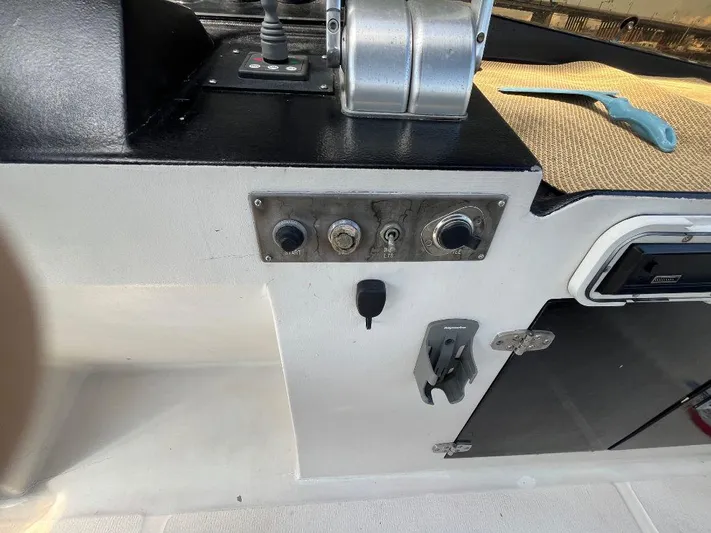 Lady Elaine Yacht Photos Pics Control panel of a 1993 Kha Shing Motoryacht with switches and throttle lever.