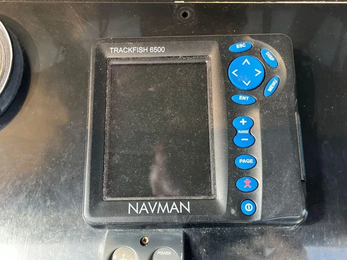 Lady Elaine Yacht Photos Pics Navman Trackfish 6500 marine GPS device on 1993 Kha Shing Motoryacht dashboard.