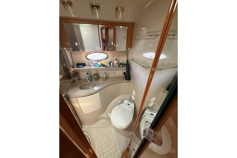 Amazing C's Yacht Photos Pics Luxurious bathroom in 2002 Regal Commodore 3860 yacht with modern amenities.
