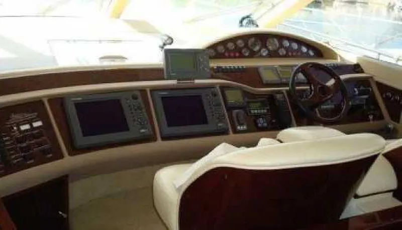  Yacht Photos Pics Luxury yacht helm with advanced navigation systems, Princess 65, 2004 model.