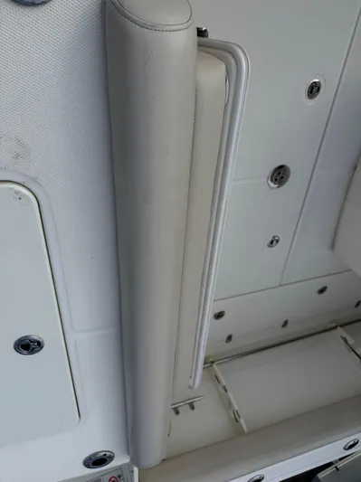 Abvios Yacht Photos Pics 2020 Boston Whaler 330 Outrage interior detail with white upholstery and fittings.