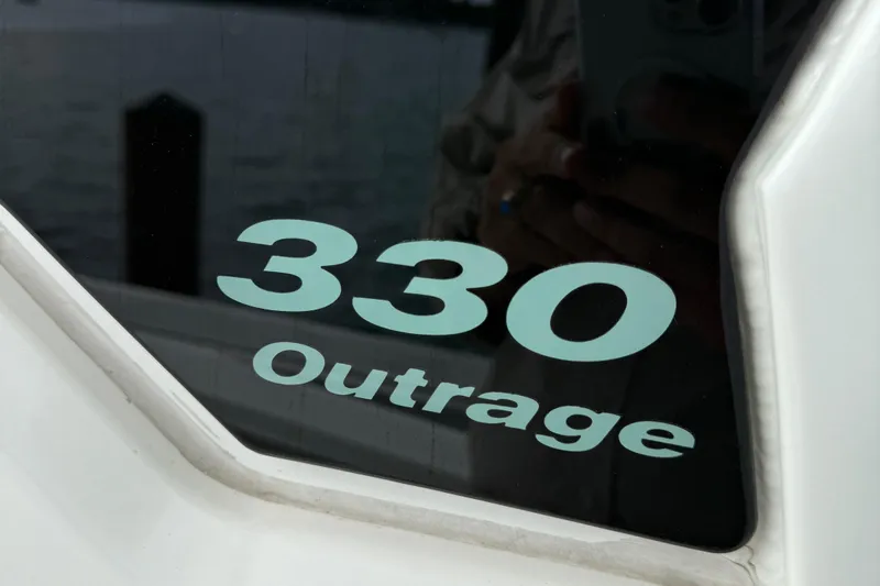 Abvios Yacht Photos Pics 2020 Boston Whaler 330 Outrage boat model name on window.