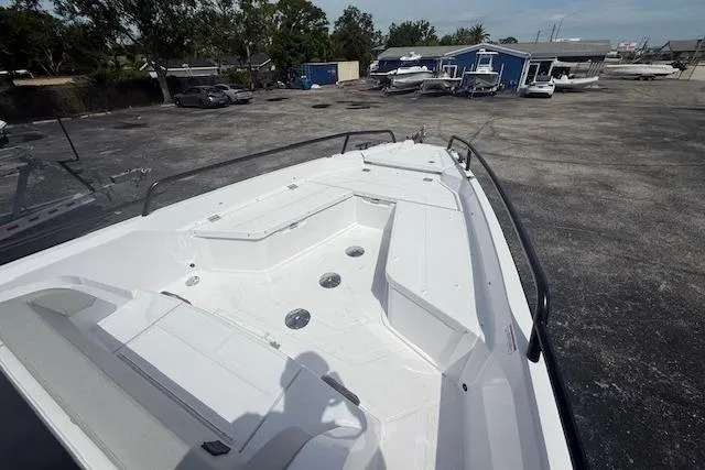  Yacht Photos Pics 2025 Axopar 29 Sun Top boat with spacious deck and seating area.