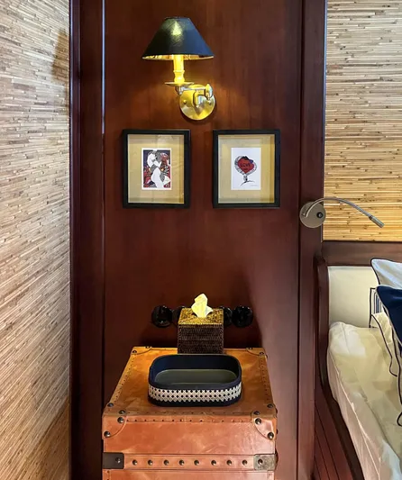 Ocean Pure Yacht Photos Pics Cozy cabin interior of 1993 Custom Gulet Motorsailer with framed art and elegant lighting.