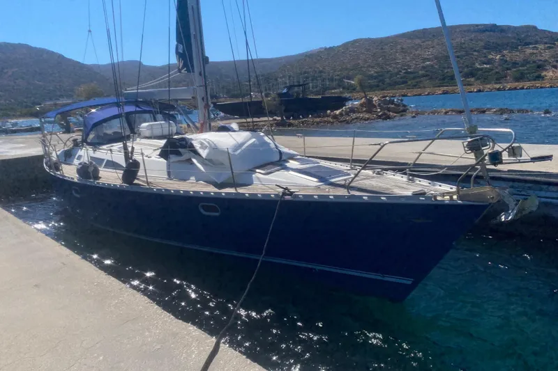  Yacht Photos Pics Jeanneau Sun Odyssey 45.2 sailboat, 2003 model, docked at marina.