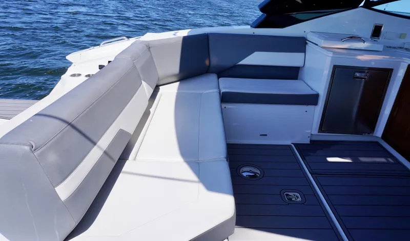  Yacht Photos Pics 2020 Cruisers Yachts 38 GLS OB interior with sleek seating and modern design on open water.