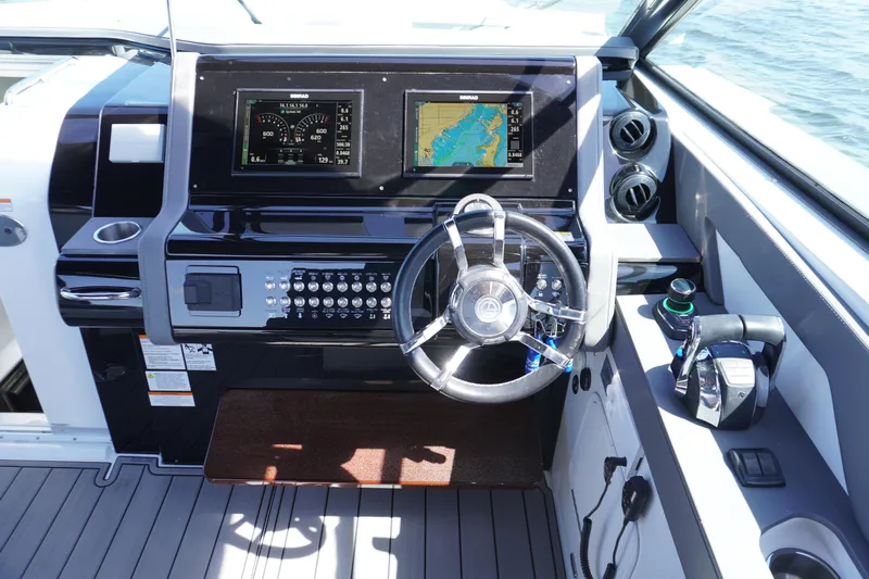  Yacht Photos Pics Helm of 2020 Cruisers Yachts 38 GLS OB with dual displays and controls.