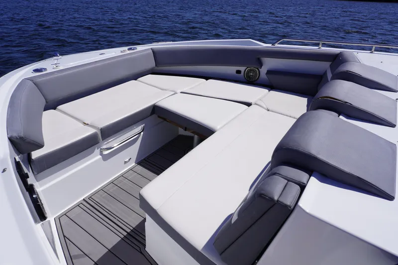  Yacht Photos Pics Luxurious seating area on 2020 Cruisers Yachts 38 GLS OB, overlooking serene blue waters.