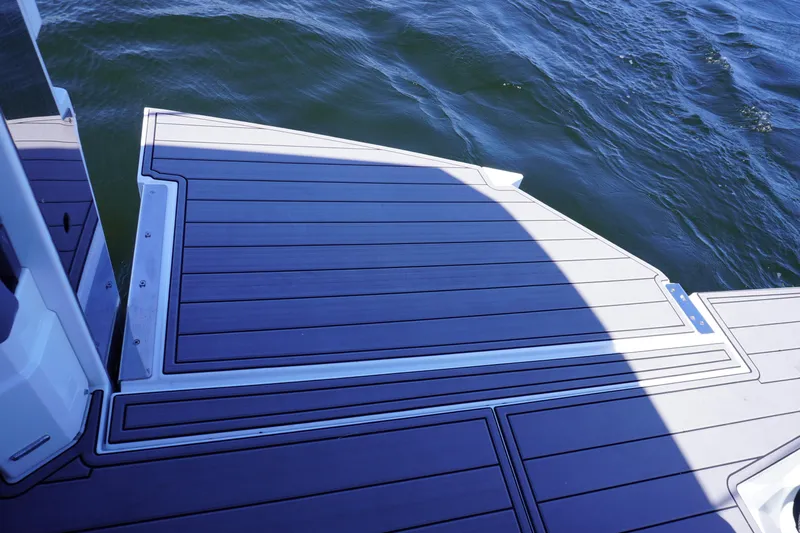  Yacht Photos Pics Deck of 2020 Cruisers Yachts 38 GLS OB, overlooking water.