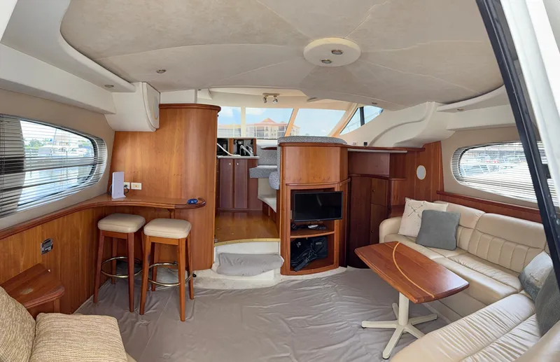  Yacht Photos Pics Interior of a 2002 Silverton 410 Sport Bridge yacht with modern furnishings.